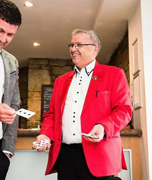Magician Keith Atkinson performing